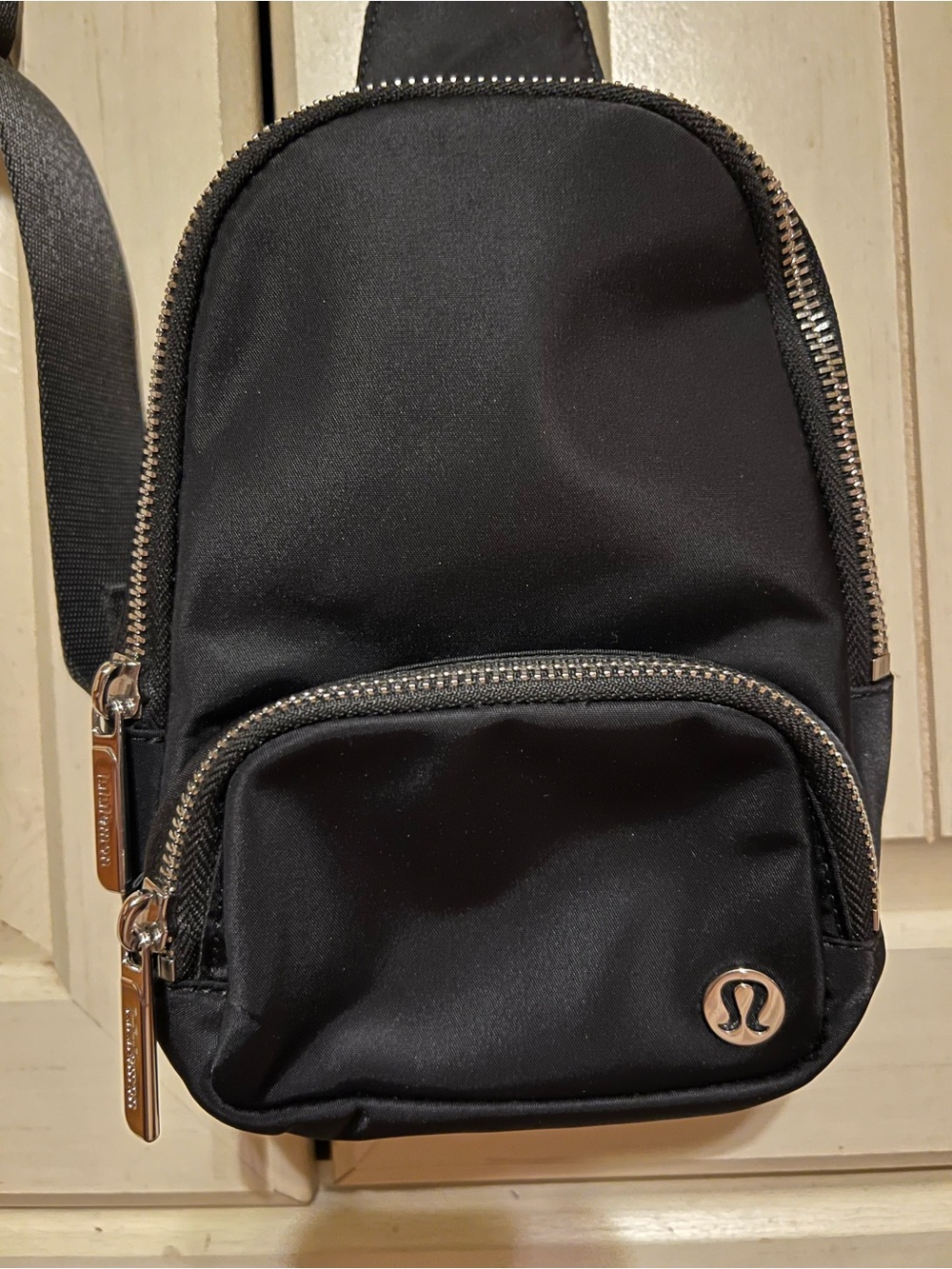 lululemon athletica Black Sling Belt Bag with Silver Accents
